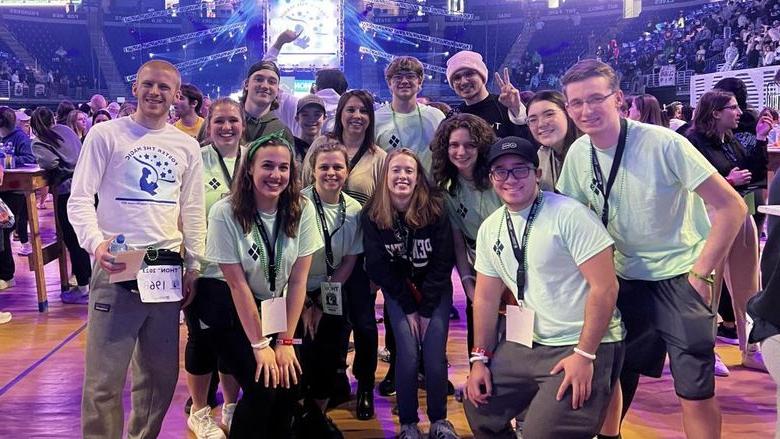 Members of the Penn State DuBois campus community, including the dancers representing the campus, gather on the main floor of the Bryce Jordan Center during the THON dance marathon